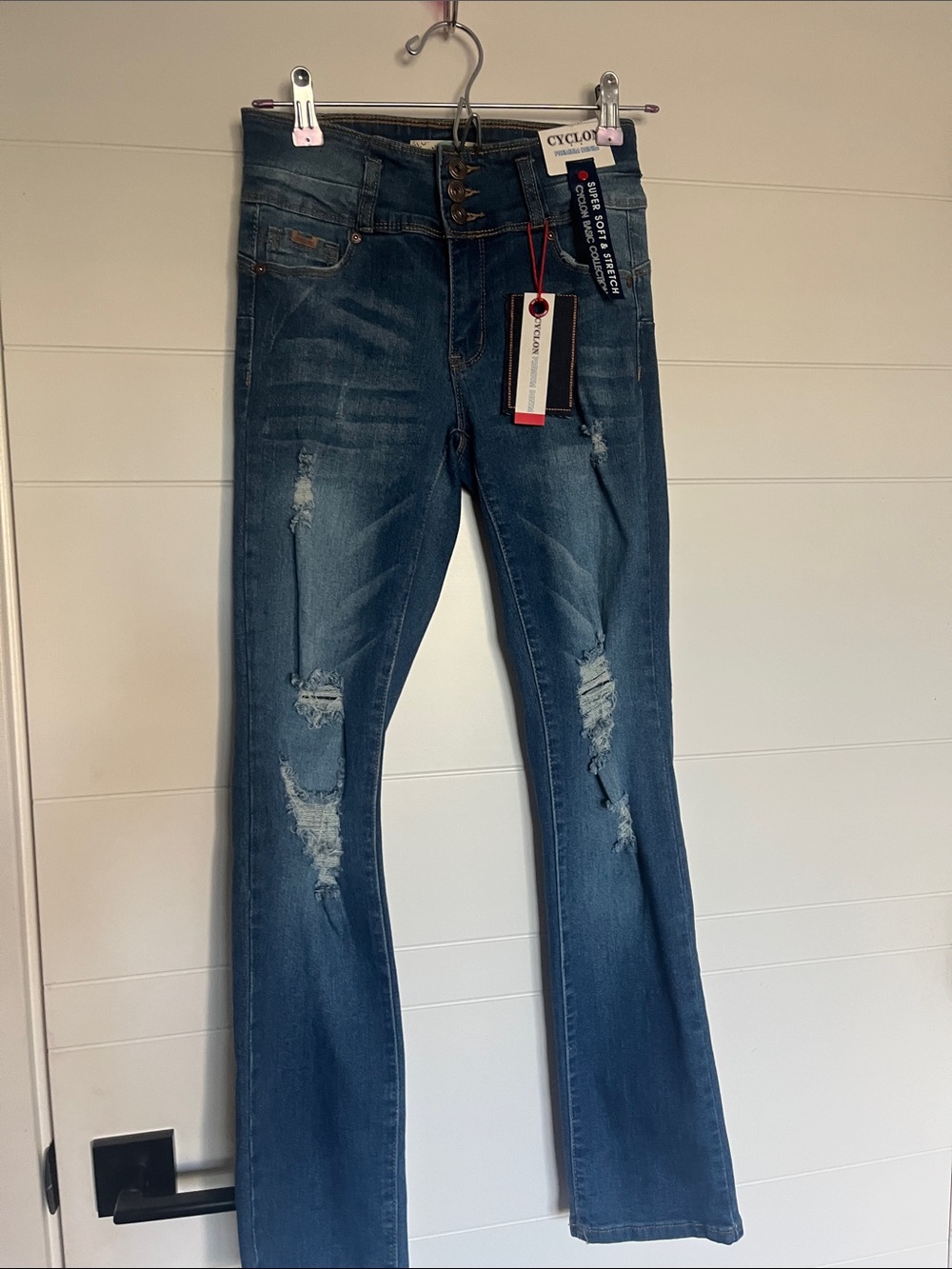 Women’s Distressed Dark Blue Jeans